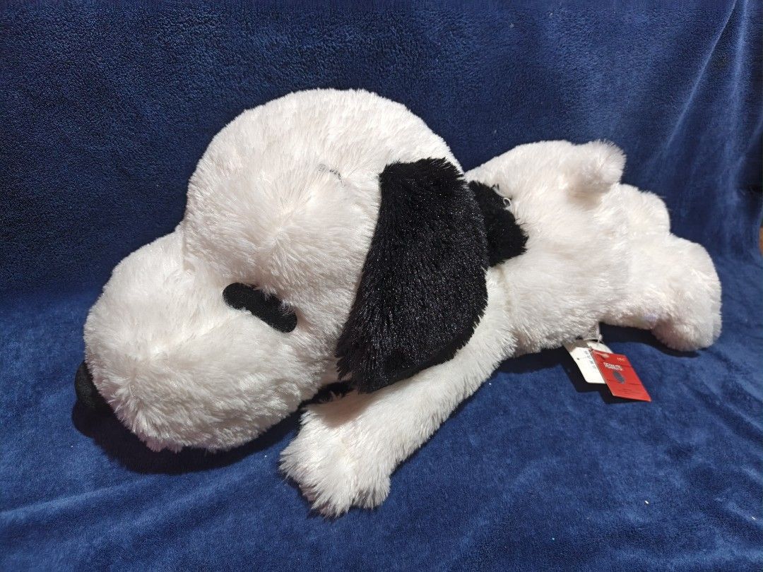Peanuts Snoopy plush toy stuffed animal (Category: Plushies & Soft Toys) located in Manila. Submitted by kirstentoyshub (Listing ID 1470379893, Image 2). Description: - Official Peanuts Snoopy plush toy in large, huggable size - Super soft white fur with classic black ears, nose, and back patch - Comes with a cute red collar and original tags still attached - Ideal for collectors or as a gift for Snoopy fans of all ages.