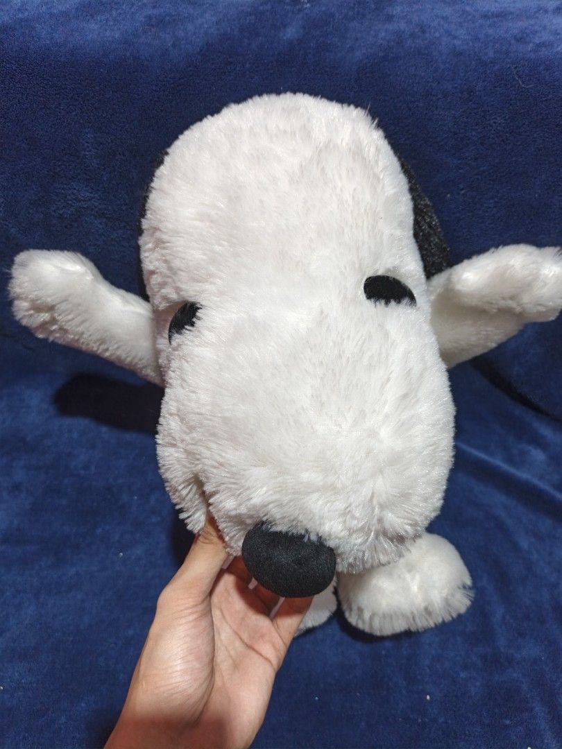 Peanuts Snoopy plush toy stuffed animal (Category: Plushies & Soft Toys) located in Manila. Submitted by kirstentoyshub (Listing ID 1470379893, Image 3). Description: - Official Peanuts Snoopy plush toy in large, huggable size - Super soft white fur with classic black ears, nose, and back patch - Comes with a cute red collar and original tags still attached - Ideal for collectors or as a gift for Snoopy fans of all ages.