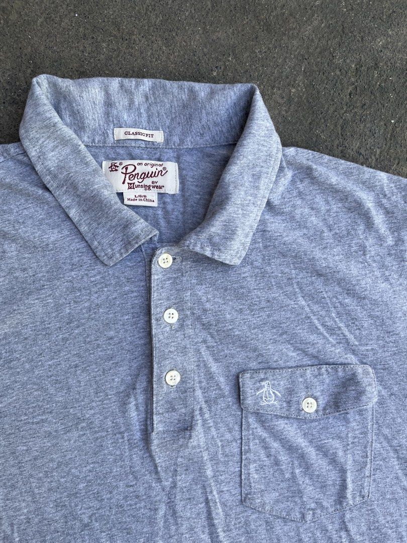 Penguin Pocket Polo Shirt (Category: Formal Shirts) located in Manila. Submitted by a.stmngo (Listing ID 1470351048, Image 3). Description: Size Large on tag Width 21 inches Length 27 inches No issue Good Condition 📍Manage your expectation. Item is thrifted. 📍Nagcarlan, Laguna.