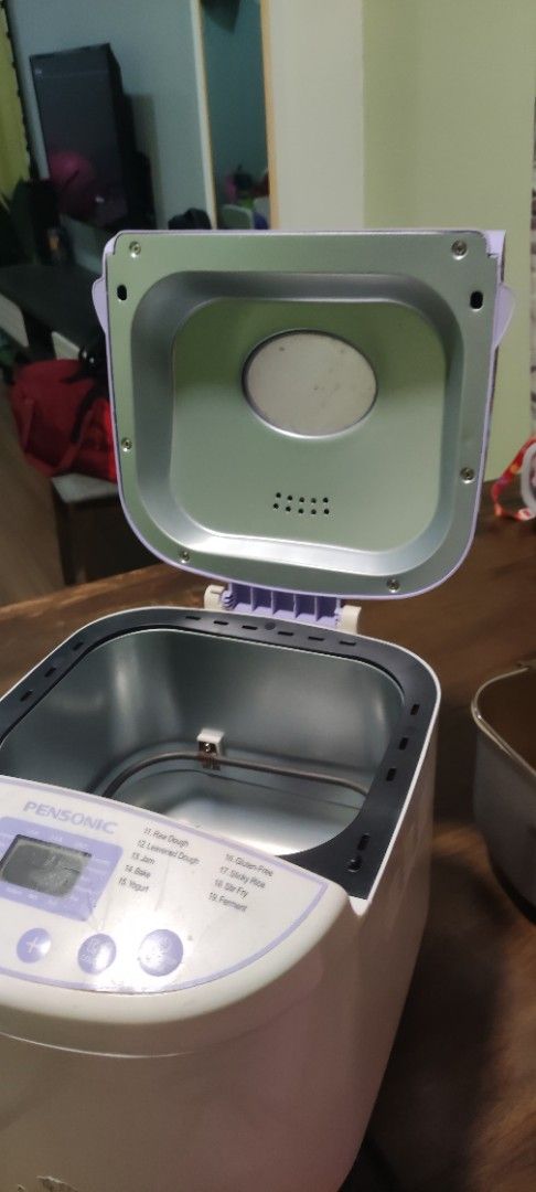 Pensonic Bread Maker Machine (Category: Breadmakers) located in Seremban. Submitted by iligan111 (Listing ID 1470501637, Image 3). Description: - Brand: Pensonic - Condition: Powers up fine / Good working condition - Features: Digital control panel with preset menus and viewing window on lid - Included: Removable non-stick inner baking pan and paddle - Plug type: Standard Malaysia 3-pin plug - Ideal for: Fresh and easy home baking.