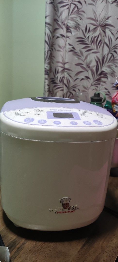 Pensonic Bread Maker Machine (Category: Breadmakers) located in Seremban. Submitted by iligan111 (Listing ID 1470501637, Image 1). Description: - Brand: Pensonic - Condition: Powers up fine / Good working condition - Features: Digital control panel with preset menus and viewing window on lid - Included: Removable non-stick inner baking pan and paddle - Plug type: Standard Malaysia 3-pin plug - Ideal for: Fresh and easy home baking.