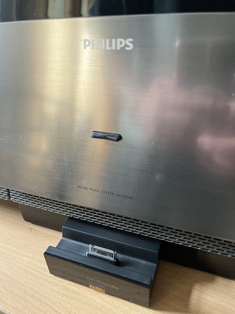 Philips DCM3060 Micro Music System (needs repair) (Category: Soundbars, Speakers & Amplifiers) located in Quezon City. Submitted by saleinqc (Listing ID 1470541839, Image 2). Description: - Brand/Model: Philips DCM3060 Micro Music System - Compatibility: Built-in dock for iPod, iPhone, and iPad - Audio Support: Plays MP3-CDs and Windows Media Audio (WMA) - Controls: Convenient top control buttons for source, skip, play/pause, menu, and volume - C