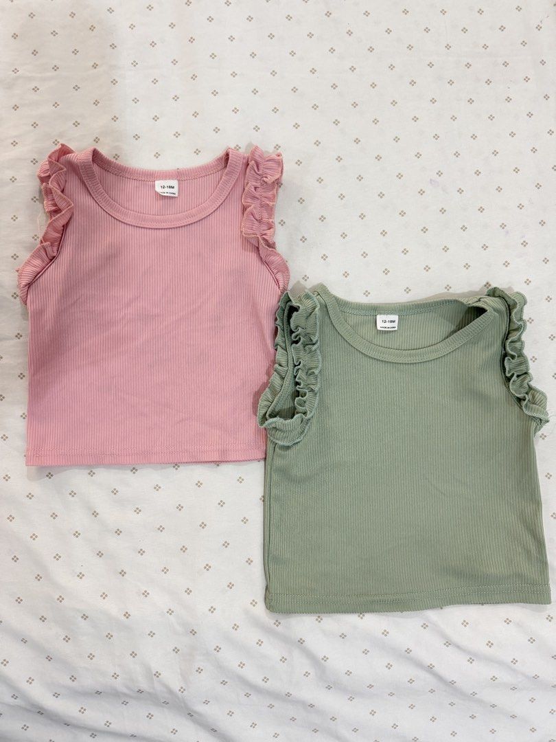 Pink & Green Top (12-18M) (Category: Babies & Kids Fashion) located in Manila. Submitted by diane.preloved0328 (Listing ID 1470429297, Image 1). Description: Pink top w ruffles Green top w ruffles 12-18M.