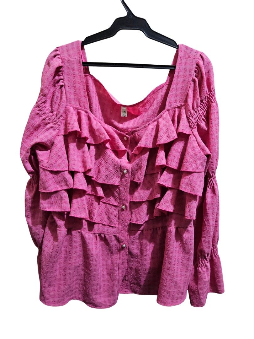 Pink Coquette Classy Flowy Ruffled Top (Category: Longsleeves) located in Taguig. Submitted by ynascorner_ (Listing ID 1470368304, Image 1). Description: pink ruffled top ⭐️ • size is not indicated but fits up to XL bodyframe • buttons are detangled easily • manage your expectations, this is thrifted top!.
