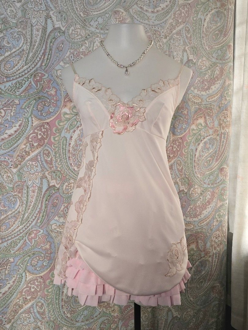 Pink Lace Trim Slip Top (Category: Dresses) located in Dagupan City. Submitted by chislocker14 (Listing ID 1470364347, Image 1). Description: - Color: Soft pink - Design: Slip dress with rose embroidery and sparkly rhinestone accents - Back: Sheer polka dot mesh panel - Hem: Layered pink ruffles - Straps: Adjustable spaghetti straps.