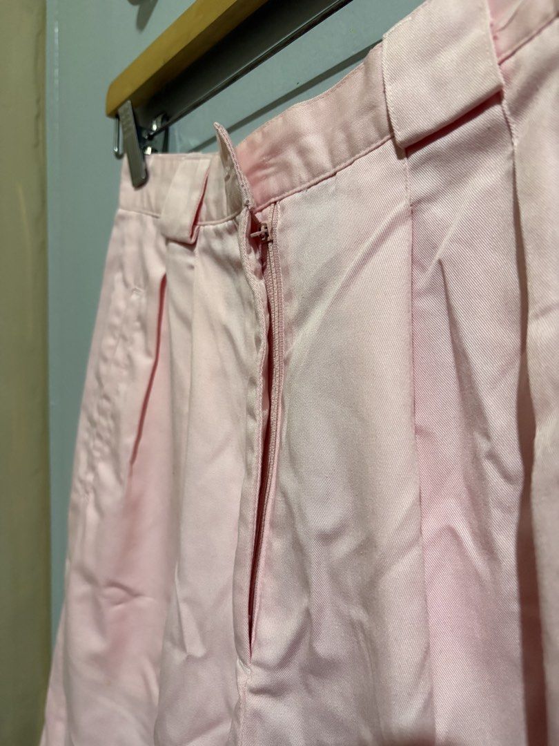 Pink Pleated High-Waisted Shorts (Category: Shorts) located in Manila. Submitted by margascloset_ (Listing ID 1470494976, Image 3). Description: Pastel pink highwaist shorts - Closure: Hook-and-bar waist with zippered fly - Design: Front pleats, belt loops, and side slash pockets - Condition: lightly used, missing button on the front - Fit: Ideal for warm weather and stylish everyday wear.