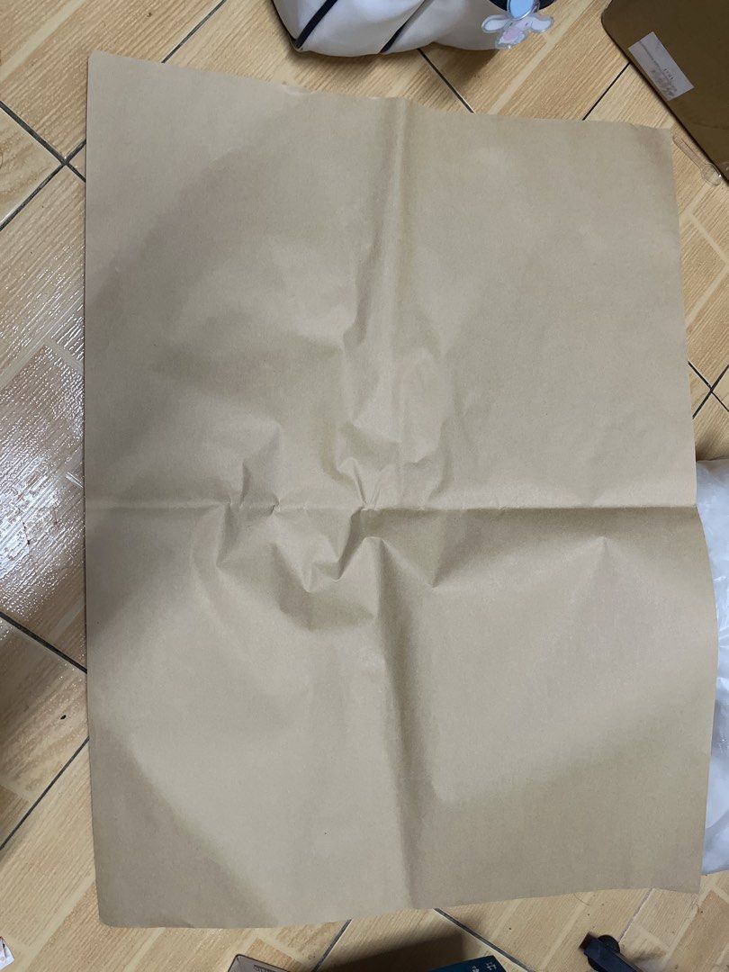 Plain Brown Kraft Wrapping Paper Sheets (Category: Craft Supplies & Tools) located in Manila. Submitted by eringeorge33487 (Listing ID 1470430795, Image 3). Description: - Type: Brown kraft wrapping paper sheets in flat pack format - Design: Completely plain surface with no printed words or patterns - Condition: Clean, brand new, and protected in original plastic packaging - Uses: Ideal for parcel shipping, packing items, and various DIY crafts.
