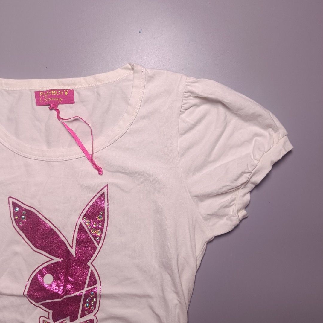 Playboy Bunny Mid Logo in White (Category: Blouses) located in Las Pinas. Submitted by jmbl.thrds (Listing ID 1470384228, Image 2). Description: Playboy Bunny Mid Logo in White 17 width 23.5 length No flaws.