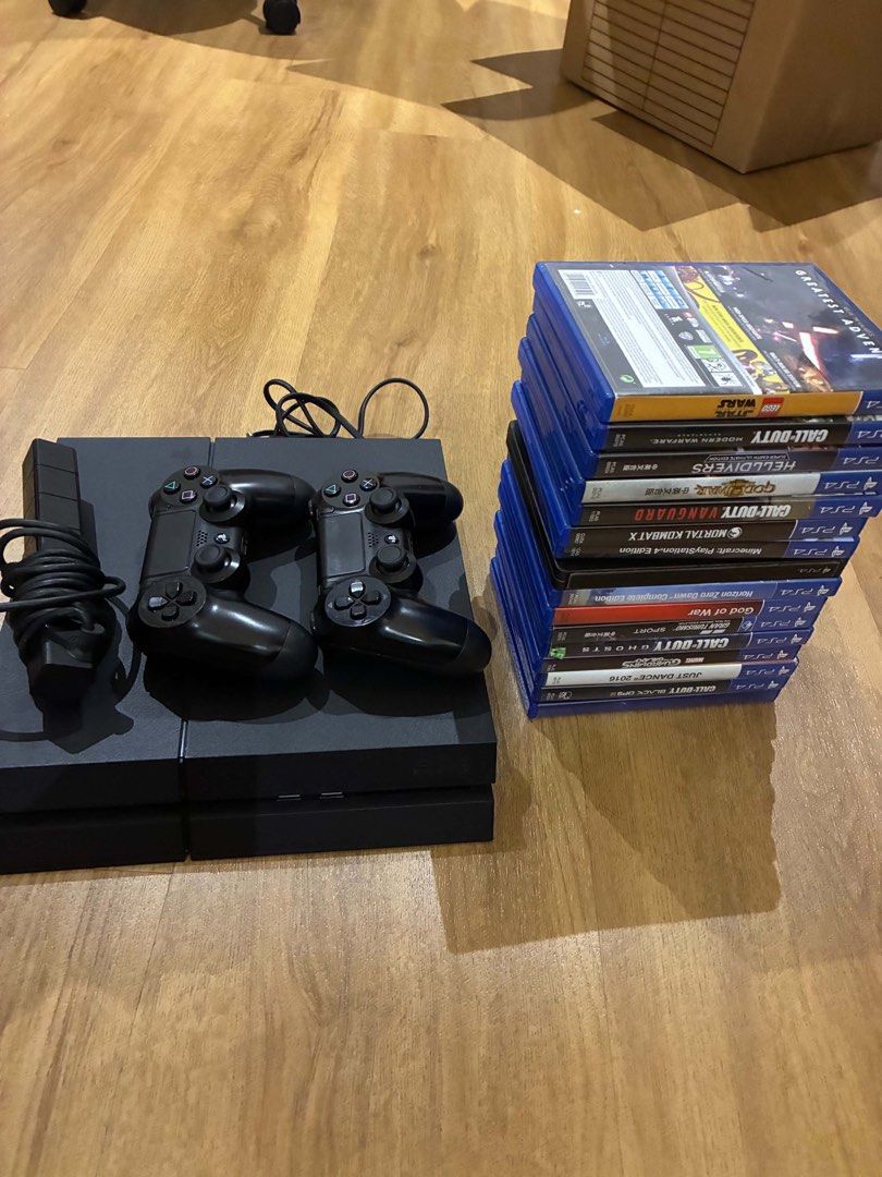 PlayStation 4 Console, Controllers, Thrustmaster Racing Wheel, and Games (Category: PlayStation) located in Marikina City. Submitted by pianicolasora (Listing ID 1470492241, Image 3). Description: - Complete PS4 console setup ready for immediate gaming - Includes two original wireless controllers and power cable - Thrustmaster Ferrari racing wheel and pedals included for realistic driving games - 13 games including God of War, Call of Duty, Morta