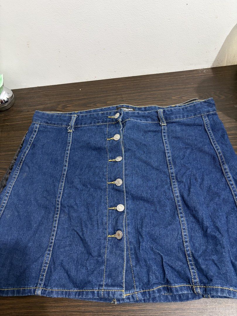 Plus size Dark wash denim skirt with front buttons (Category: Skirts) located in Taguig. Submitted by preloved_by_janel (Listing ID 1470508520, Image 1). Description: - Dark wash denim skirt non stretch -Waistline: 34-35 inches - Silver metal front button closure - Straight hemline.