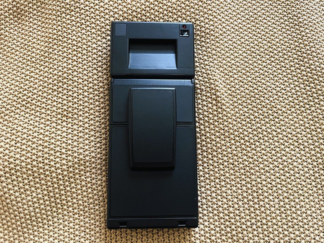 Polaroid SLR 680 SE (Refurbished 2024) (Category: Cameras) located in Rizal. Submitted by ndvxvnty (Listing ID 1470531326, Image 2). Description: - Model: Polaroid SLR 680 SE Folding Instant Camera - Fully working, no damage. - Price: 45,000 - Bought from Brooklyn Film Camera, USA for 47,000 plus 6,900 shipping fee and 12k plus Custom tax duty. - Color: Classic Black - Features: Built-in flash and sonar autofocus for sharp shots - Design: Iconic 