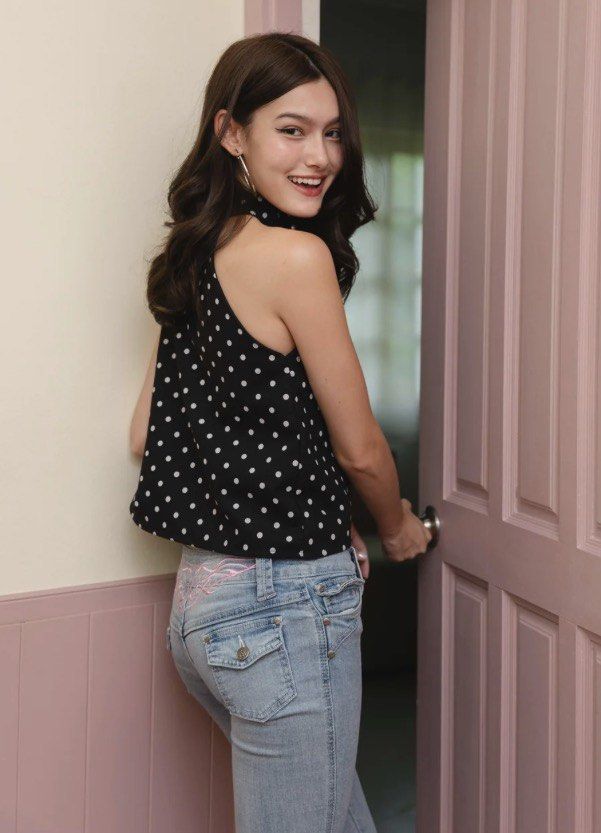 Polka dot halter top (Category: Sleeveless) located in Quezon City. Submitted by monmonmon13 (Listing ID 1470392366, Image 2). Description: Polka dot black and white halter top ♣️ - size SMALL - keyhole cutout at the neckline with a single pearl button closure - cotton linen fabric - never used, just fitted - no issues - retail price: P1749 - super nice for casual looks and the upcoming holidays 🎆.