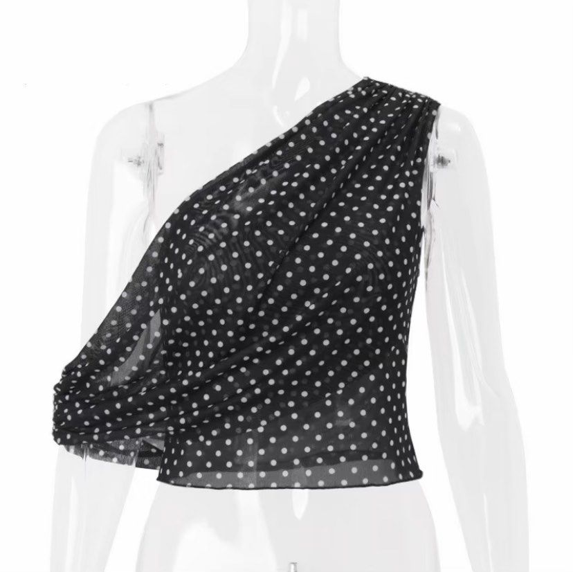Polka Dot Off-shoulder Sleeveless Top (Category: Sleeveless) located in Caloocan City. Submitted by lovedbyryu (Listing ID 1470478379, Image 1). Description: - Brand: Candyhot - Pattern: Black and white polka dot - Design: One-shoulder with draped mesh fabric - Fit: Slim fitting, short crop length - Material: Lightweight and breathable polyester - Occasion: Great for nights out or casual summer wear.