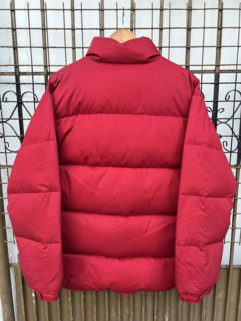 Polo Jeans Co. Ralph Lauren Red Puffer Jacket (Category: Coats, Jackets and Outerwear) located in Manila. Submitted by tomdenzell38299 (Listing ID 1470534830, Image 3). Description: - Brand: Polo Jeans Co. Ralph Lauren - Color: Bright red - Design: Embroidered US flag logo on the chest - Warmth: Thick quilted padding for heavy cold-weather protection - Collar: High stand-up collar with snap buttons over front zip - Pockets: Two lower front patch 