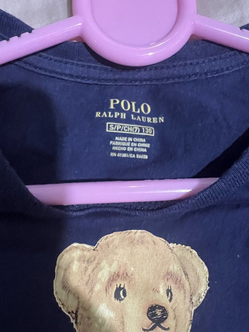 Polo Ralph Lauren Bear (Category: Babies & Kids Fashion) located in Makati City. Submitted by tinkrbelle (Listing ID 1470401522, Image 3). Description: - Brand: Polo Ralph Lauren (original, US bought) - Color: Dark Blue - Size: S / P / CH (7) - 130 - Design: Iconic Polo Bear graphic print on front - Style: Short sleeves, crew neck, T-shirt dress - Condition: Excellent / Pre-loved *payment thru gcash *delivery fee c/o buyer.