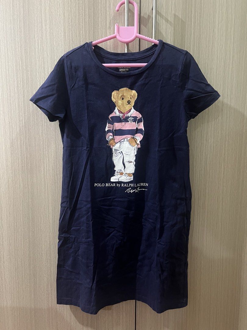Polo Ralph Lauren Bear (Category: Babies & Kids Fashion) located in Makati City. Submitted by tinkrbelle (Listing ID 1470401522, Image 1). Description: - Brand: Polo Ralph Lauren (original, US bought) - Color: Dark Blue - Size: S / P / CH (7) - 130 - Design: Iconic Polo Bear graphic print on front - Style: Short sleeves, crew neck, T-shirt dress - Condition: Excellent / Pre-loved *payment thru gcash *delivery fee c/o buyer.