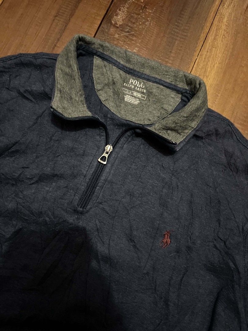 Polo Ralph Lauren Blue Quarter Zip Pullover (Category: Coats, Jackets and Outerwear) located in Manila. Submitted by adzwilnams67005 (Listing ID 1470500110, Image 2). Description: - Brand: Polo Ralph Lauren - Item: Cotton Quarter Zip Pullover - Color: Blue with contrast grey collar lining - Size: L (180/100A) - Details: Embroidered chest pony logo, branded zip hardware, ribbed cuffs and hem - Material: Soft cotton, made in Sri Lanka - Condition: 