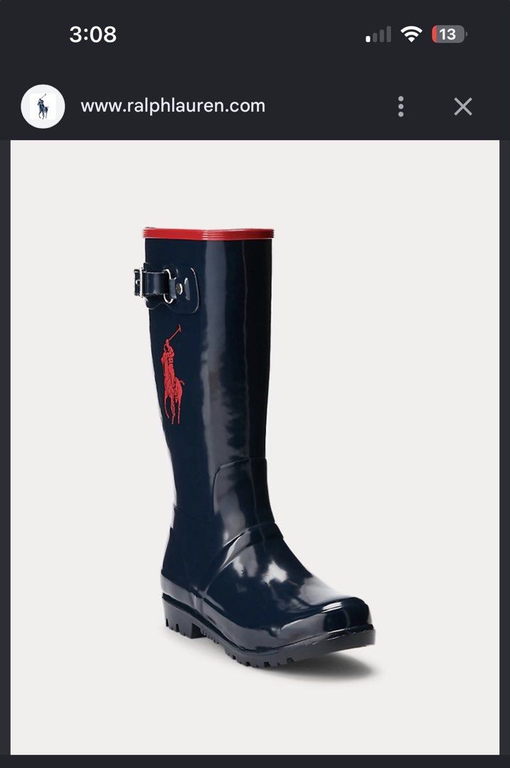 Polo Ralph Lauren Navy Blue Rain Boots (Category: Boots) located in Rosales. Submitted by thriftingismygame (Listing ID 1470413541, Image 1). Description: - Brand: Polo Ralph Lauren - Color: Navy blue gloss with red accents - Features: Big red pony logo, red collar trim, red heel lettering, and adjustable side buckle - Sole: Thick lug soles for excellent wet-weather traction - Condition: Clean, worn very little - Perfect for rainy season in the P
