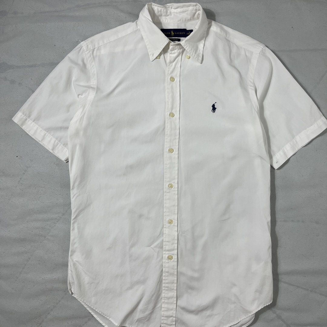 Polo RL Ralph Lauren White Buttondown Large (Category: Tshirts & Polo Shirts ) located in Nasugbu. Submitted by janstuffs.ph (Listing ID 1470495189, Image 2). Description: Pólö RL White Buttondown 💯Legit! Size: Small on tag - fit up to Large Width: 21" Length: 28" Condition: 10/10 Good as new Flaw: NONE Mine: 1980 •Buyer shoulder shipping fee - ship via j&t. •Read details before purchasing..