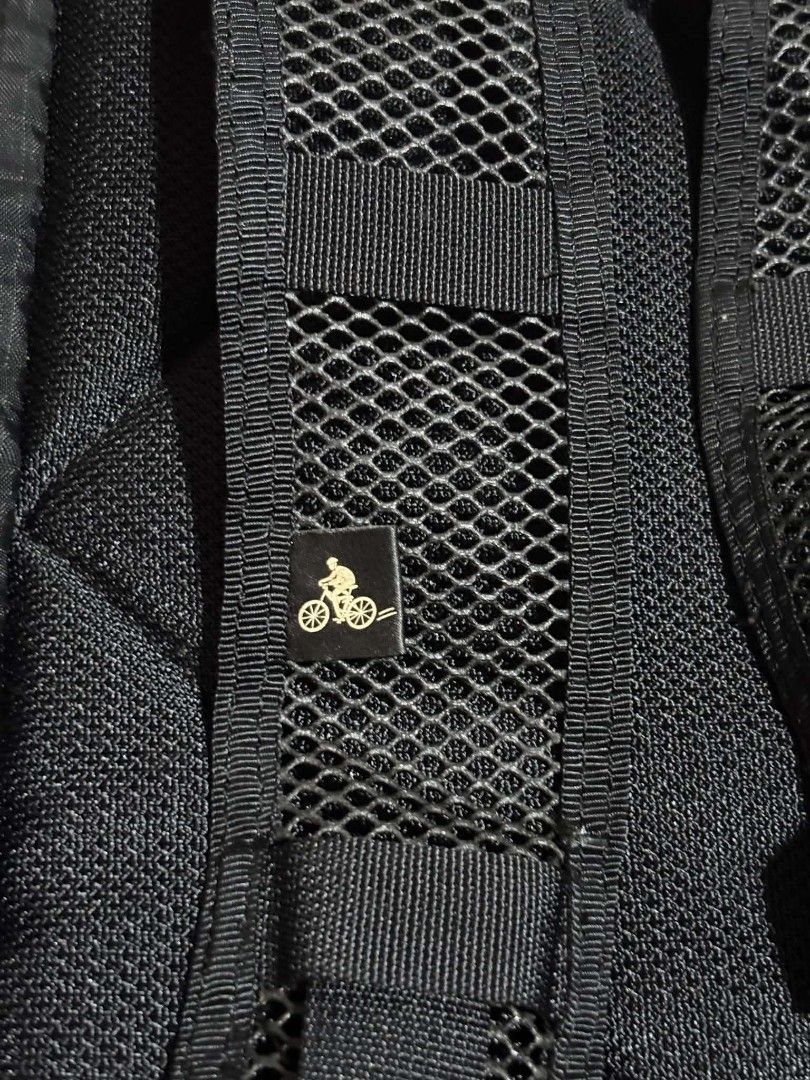 Porter Yoshida & Co. Bicycle Style Backpack (Category: Backpacks) located in Daet. Submitted by jemotovlog28 (Listing ID 1470398117, Image 3). Description: - Authentic Porter Yoshida & Co. Bicycle Style backpack - Made from durable, high-quality black ripstop fabric - Padded mesh shoulder straps with secure buckle closures - Multiple exterior straps, buckles, and drawcords for gear adjustment - Signature Porter branded woven patch on the front - 