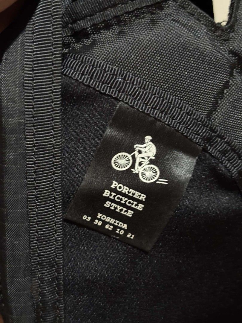 Porter Yoshida & Co. Bicycle Style Backpack (Category: Backpacks) located in Daet. Submitted by jemotovlog28 (Listing ID 1470398117, Image 2). Description: - Authentic Porter Yoshida & Co. Bicycle Style backpack - Made from durable, high-quality black ripstop fabric - Padded mesh shoulder straps with secure buckle closures - Multiple exterior straps, buckles, and drawcords for gear adjustment - Signature Porter branded woven patch on the front - 