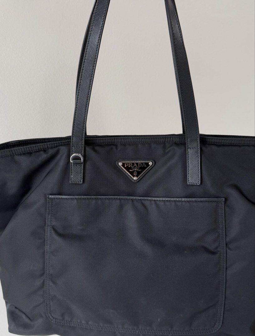 Prada black nylon tote handbag (Category: Luxury Bags & Wallets) located in Baguio. Submitted by craft.matcha (Listing ID 1470442725, Image 1). Description: PRADA Black Nylon Medium Tote Bag 1BG052 No flaws Slightly negotiable With shipping discount Gcash MOP .