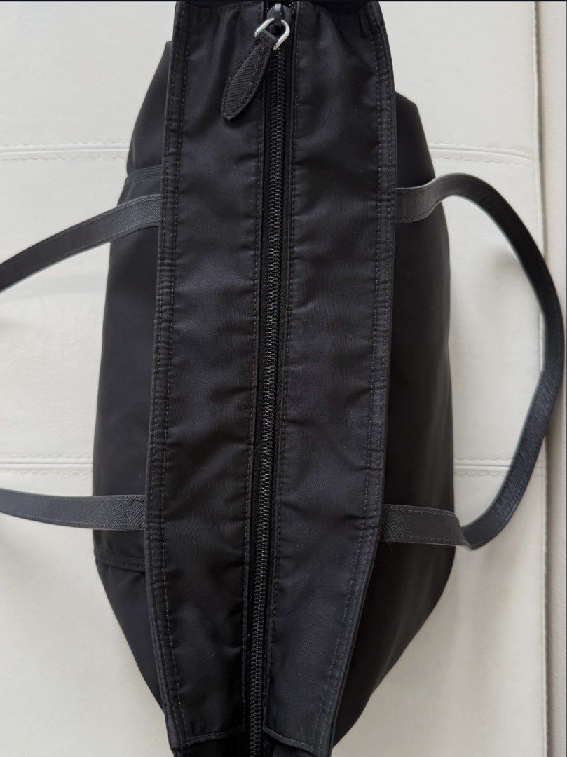 Prada black nylon tote handbag (Category: Luxury Bags & Wallets) located in Baguio. Submitted by craft.matcha (Listing ID 1470442725, Image 2). Description: PRADA Black Nylon Medium Tote Bag 1BG052 No flaws Slightly negotiable With shipping discount Gcash MOP .