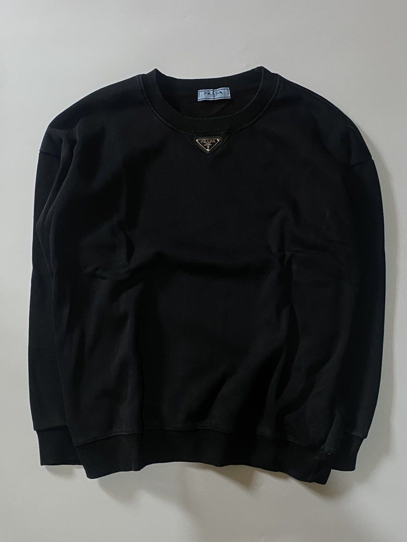 Prada Black Sweatshirt (Category: Coats, Jackets and Outerwear) located in Manila. Submitted by finofindthisart (Listing ID 1470532354, Image 2). Description: Length 24 Width 22 Measured it by inches Issue: N/A This is a pre-loved/thrifted items and may show minor signs of issue due to its vintage nature. Kindly manage expectations. No refunds or exchanges will be accepted. 📍Pasay City DM for inquiries..