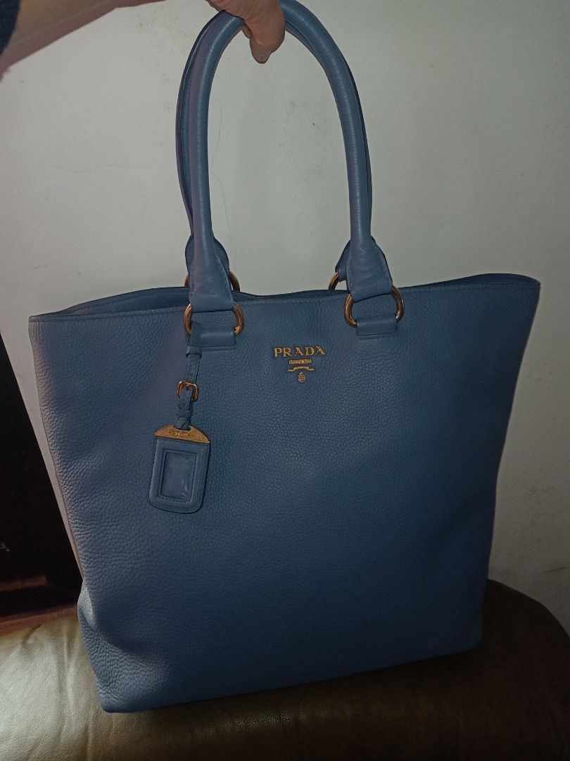 Prada Blue vitelo daino Tote Bag (Category: Tote Bags) located in Baguio. Submitted by j.miley (Listing ID 1470385923, Image 1). Description: - Brand: Prada - Color: Beautiful blue - Material: Premium pebbled leather - authentic -missing sling.
