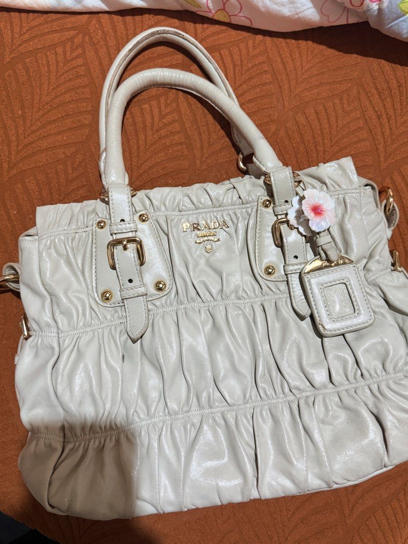 Prada Gaufre ruched leather tote (Category: Luxury Bags & Wallets) located in Manila. Submitted by ricaandherthings (Listing ID 1470506239, Image 1). Description: Prada Gaufre ruched leather tote.