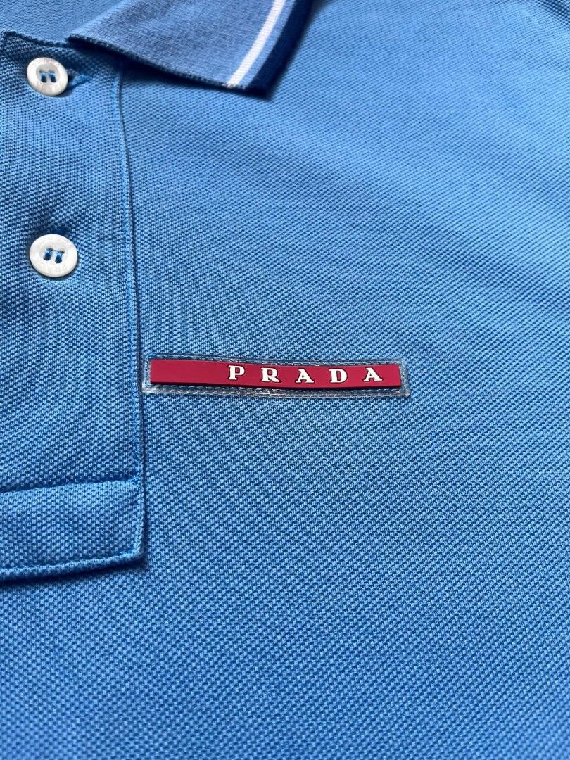 PRADA POLO SHIRT (Category: Tshirts & Polo Shirts ) located in Tacloban City. Submitted by lcortuna0908183 (Listing ID 1470361674, Image 3). Description: PRADA POLO SHIRT DIMES: W 19 L 26.5 CR: 9.5/10 EXCELLENT CONDITION NO ISSUE ( COLOR MAY DUE TO LIGHT) DM FOR MORE INFO📩.