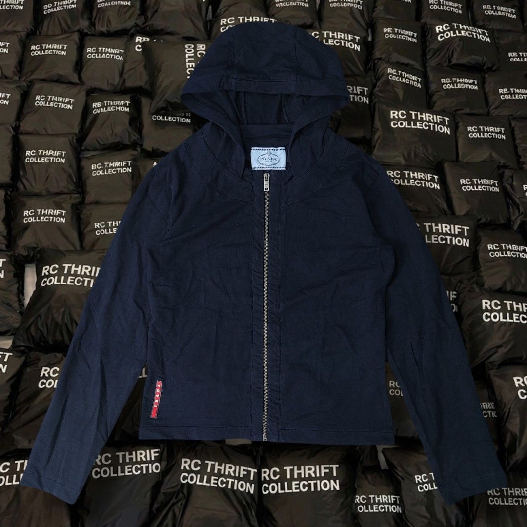 PRADA RED TAB ZIP UP JACKET WOMEN'S (Category: Coats, Jackets and Outerwear) located in Rizal. Submitted by rcthriftcollection (Listing ID 1470476392, Image 1). Description: PRADA RED TAB ZIP UP JACKET WOMEN'S Width 18.5 inch Length 22 inch Best fit Small Excellent No issue DM📥📥📥 Location: MONTALBAN, RODRIGUEZ, RIZAL .