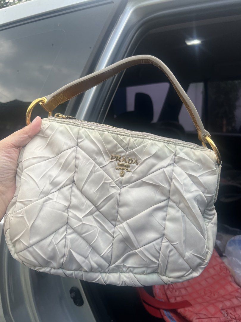 Prada Tessuto Chevron (Category: Luxury Bags & Wallets) located in Quezon City. Submitted by twishqueenr (Listing ID 1470468750, Image 1). Description: Authentic Small size Can fit long wallet No holes no rips .
