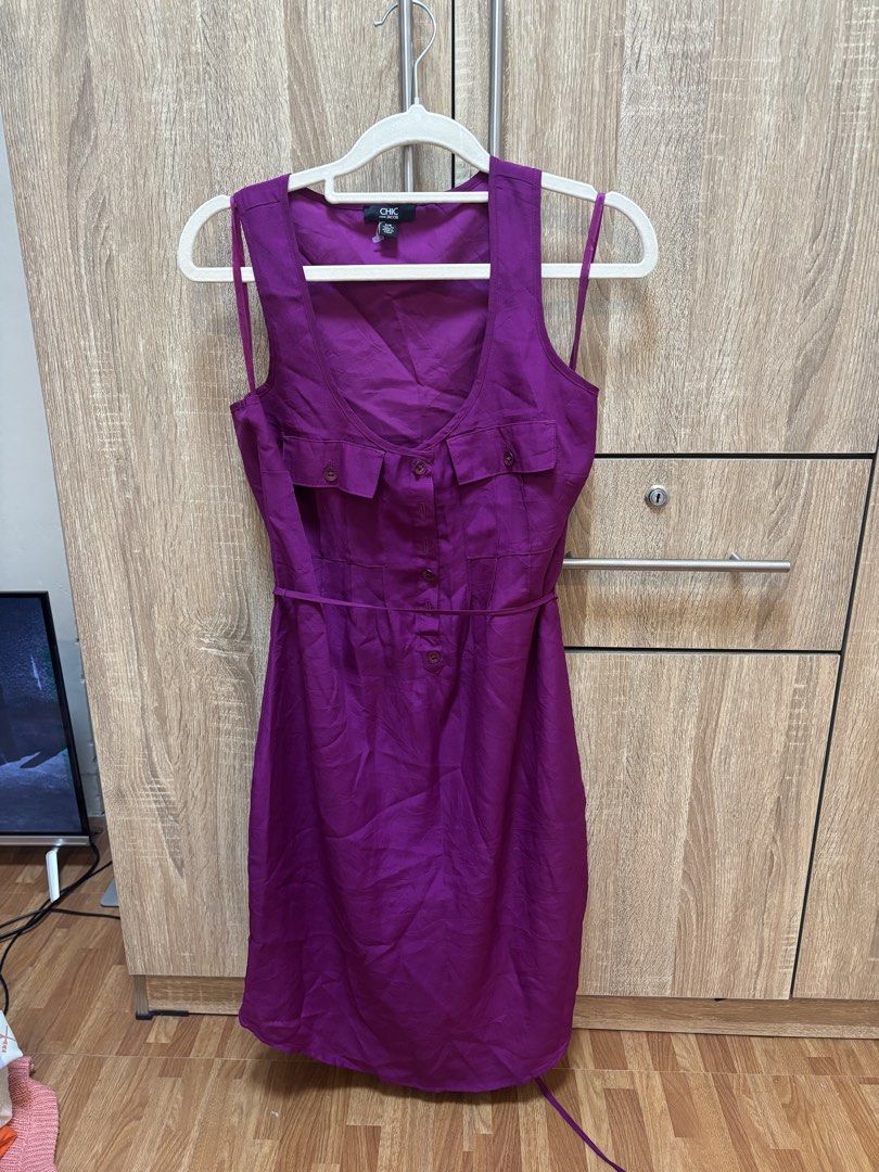 [Pre-Loved] Chic purple sleeveless button-down dress (Category: Dresses) located in Quezon City. Submitted by ellaaashi_ (Listing ID 1470464834, Image 1). Description: [Pre-Loved Dress] - used once -S on tag but can fit Medium sized body shape - with tie on the back DM for other questions.