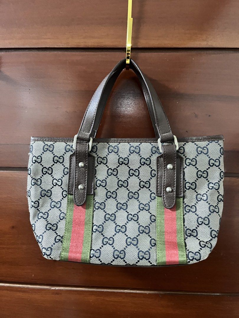 Preloved GG hand shoulder Bag (Category: Shoulder Bags) located in Manila. Submitted by all.love.thrift.shop.v2 (Listing ID 1470490198, Image 2). Description: For sale! GG bag Excellent condition ₱499 + sf As is, No return No exchange No refund Color may vary due to lighting All items are cleaned before shipping Payment first via gcash/maya/gotyme/maribank bank transfer 💰 Ship via LBC/J&T/Lalamove 🚛 📍 Cainta, Rizal ❤️.