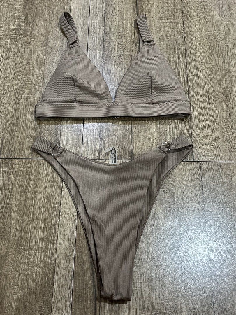 Pre-loved Two Piece Ribbed Swimsuit (Category: Bikinis & Swimsuits) located in Las Pinas. Submitted by kathybianca (Listing ID 1470493396, Image 1). Description: ‼️ the swimsuit is washed thoroughly, but I highly encouraged to wash again before use. - used once - with padding and pad slot RFS: -Decluttering.