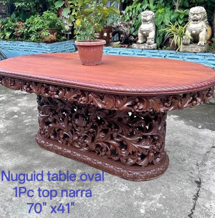 PRE-WAR NUGUID TABLE 1PC TOP NARRA (Category: Tables & Sets) located in Manila. Submitted by carmelites36250 (Listing ID 1470375889, Image 1). Description: Pre-war NUGUID table Dining Beautiful intrecate carvings 1Piece top solid narra wood size-70" x41" x30"-Lwh 30,000 Only ✅.