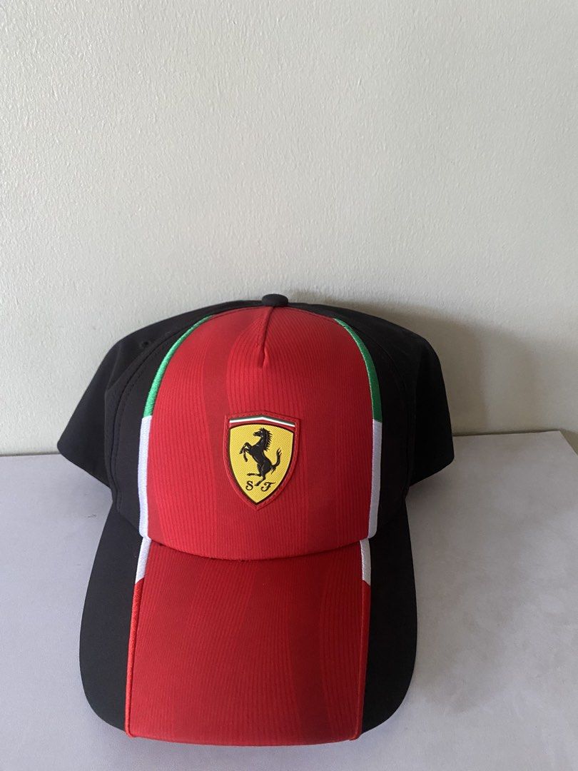 Puma Ferrari Scuderia Cap (Category: Caps & Hats) located in Manila. Submitted by primomirp (Listing ID 1470411746, Image 1). Description: - Brand: Puma x Scuderia Ferrari - Color: Black and red with Italian flag tricolor stripes - Logos: Embroidered Puma jumping cat on the back - Details: Tricolor undervisor panels (green, white, red) - Closure: Adjustable snapback with tricolor accent.