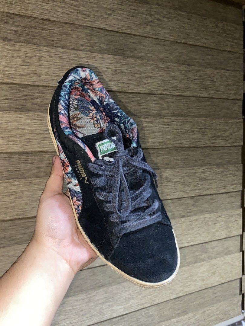 Puma Suede Floral Black Sneakers (Category: Sneakers) located in Quezon City. Submitted by notmiggol (Listing ID 1470523672, Image 3). Description: Black Puma Suede sneakers with a colorful floral print inside and along the side stripe. Classic lace-up style with textured rubber soles. Gold Puma branding on the side. Normal signs of wear on the midsoles, uppers still in solid shape. Comfortable casual shoes. Well used .