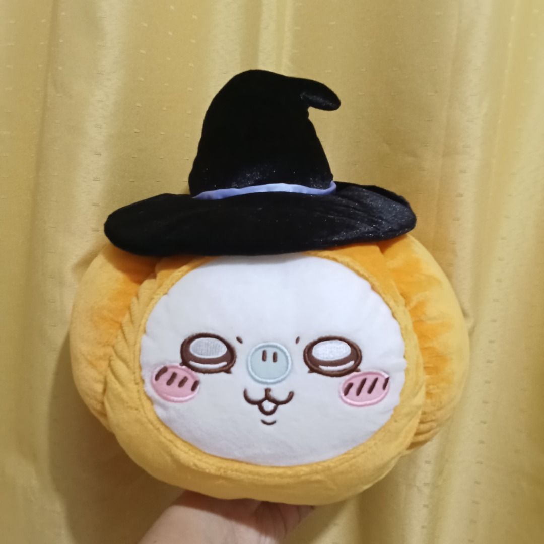 Chiikawa Momonga Pumpkin with witch hat costume (Category: Plushies & Soft Toys) located in Quezon City. Submitted by trinket_cat (Listing ID 1470460902, Image 1). Description: - Adorable orange pumpkin plush toy with a black witch hat and cute face - Features fun white dangling feet at the bottom - Made from super soft and squishy material - Perfect as a Halloween decoration or cozy huggable pillow - Great gift for plush collectors and Halloween