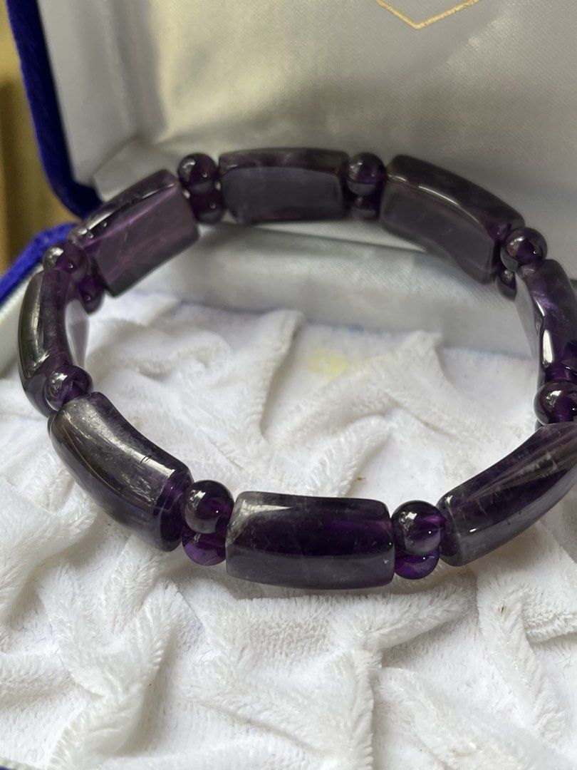 Purple Amethyst Stone Beaded Bracelet with Box (Category: Bracelets) located in Tandag. Submitted by maryarlale42144 (Listing ID 1470363664, Image 2). Description: - Genuine deep purple amethyst gemstone bracelet - Features alternating rectangular blocks and small round spacer beads - High polish finish with rich dark violet color throughout - Elastic cord for comfortable stretching and easy wear.