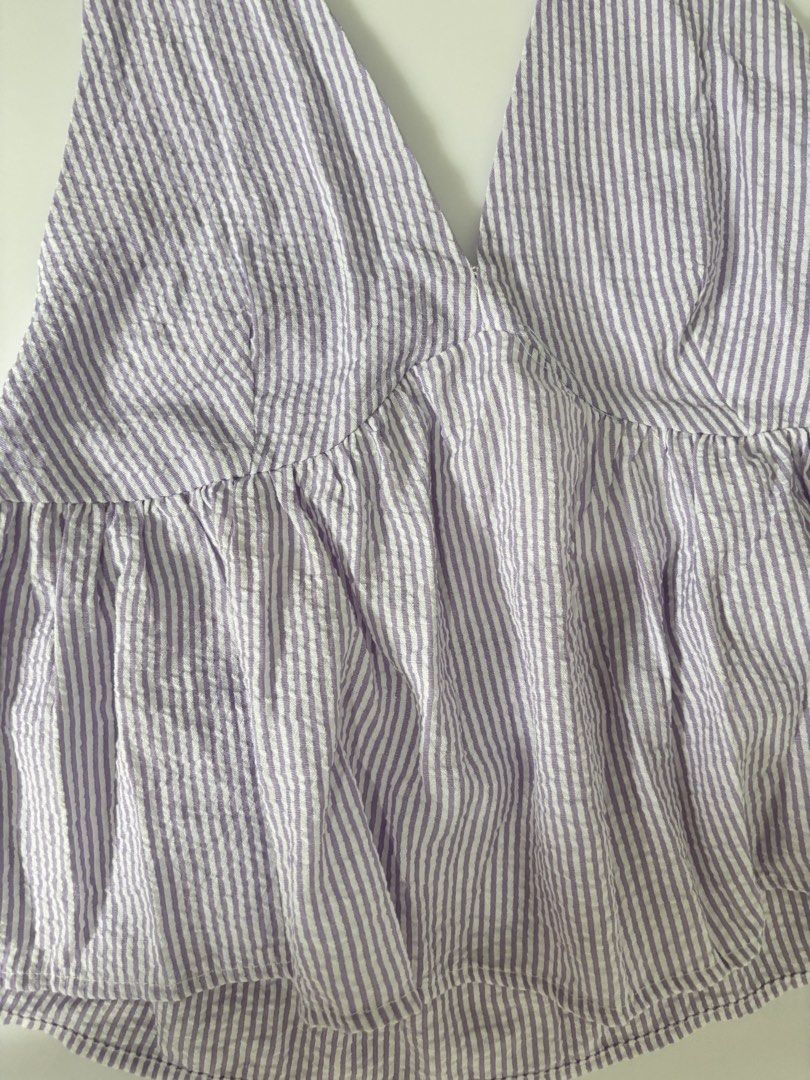 purple low back halter top (Category: Sleeveless) located in Binan City. Submitted by byhiraeth (Listing ID 1470477746, Image 2). Description: -small to medium -no ww -will only entertain offers since IM out of reply quota -loc is santa rosa, laguna.