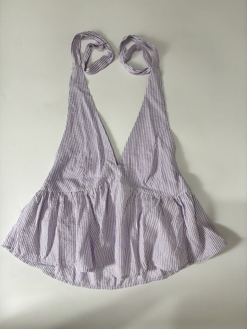 purple low back halter top (Category: Sleeveless) located in Binan City. Submitted by byhiraeth (Listing ID 1470477746, Image 1). Description: -small to medium -no ww -will only entertain offers since IM out of reply quota -loc is santa rosa, laguna.