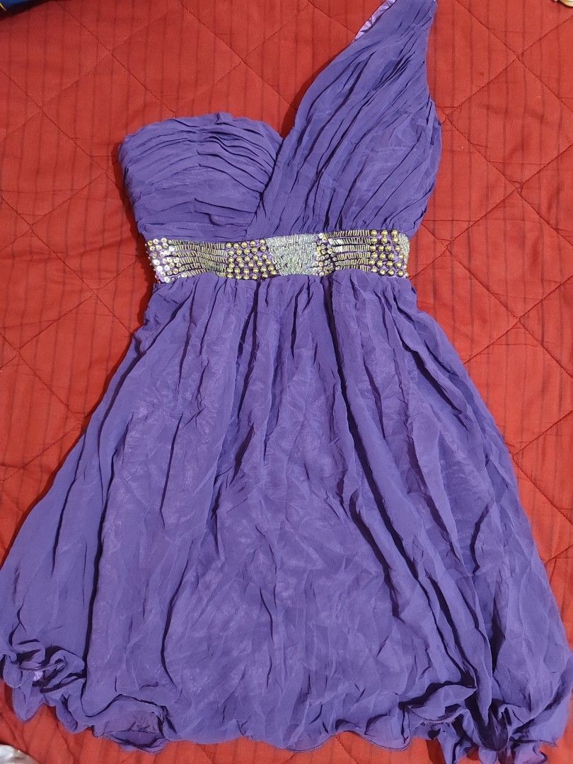 Purple One-Shoulder Bubble Chiffon Dress (Category: Dresses) located in Iloilo. Submitted by cynehllevie (Listing ID 1470373112, Image 1). Description: 🍥an elegant one-shoulder neckline with a beautifully pleated, ruched bodice. The waist is accentuated by a thick, eye-catching belt fully detailed with sparkling silver sequins and gold beads. 🍥Perfect for proms, weddings, cocktails, formal dinners, or festive holiday parties! 🍥size s-m.