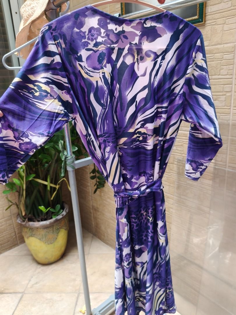 Purple Patterned Wrap around Dress With Tie Belt (Category: Dresses) located in Manila. Submitted by olxph_674182959 (Listing ID 1470362596, Image 3). Description: - Style: V-neck wrap dress with matching waist tie - Print: Chic mixed animal and floral design - Sleeves: Three-quarter length - Material: Lightweight, breathable, and easy to slip on - Fit: Adjustable wrap style for a custom fit - Occasion: Perfect for casual wear, dates, or weekend 