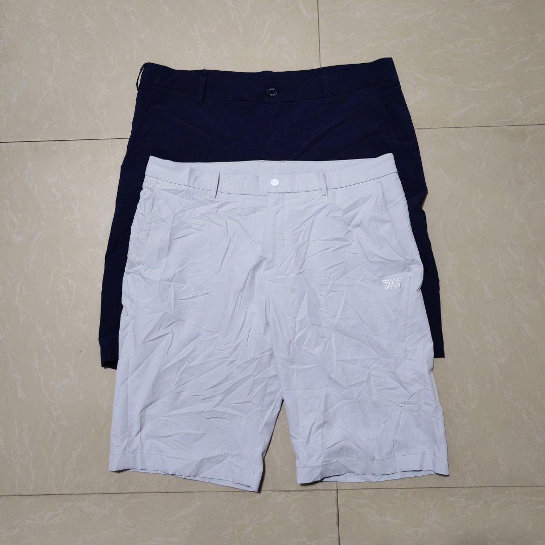 PXG Men's Golf Shorts Bundle Size XL (Category: Shorts) located in Manila. Submitted by ryandip88861707 (Listing ID 1470454695, Image 1). Description: Bundle of two pairs of PXG golf shorts. One light grey, one navy blue. Size XL. Made from polyester and elastane blend, super stretchy and comfortable for the course. Multiple pockets front and back. Clean condition, no stains or damage found. Great for hot weather on the green..