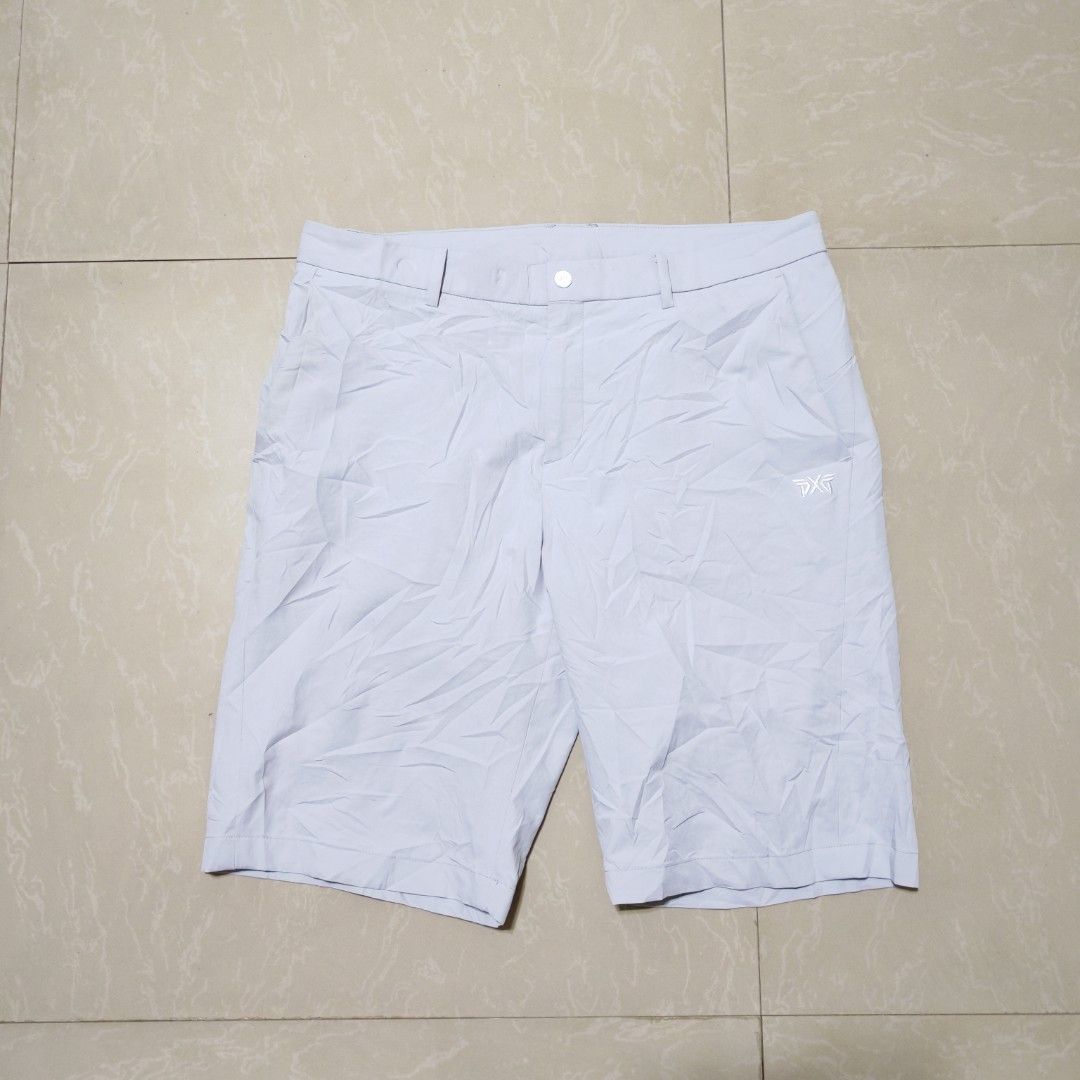 PXG Men's Golf Shorts Bundle Size XL (Category: Shorts) located in Manila. Submitted by ryandip88861707 (Listing ID 1470454695, Image 2). Description: Bundle of two pairs of PXG golf shorts. One light grey, one navy blue. Size XL. Made from polyester and elastane blend, super stretchy and comfortable for the course. Multiple pockets front and back. Clean condition, no stains or damage found. Great for hot weather on the green..