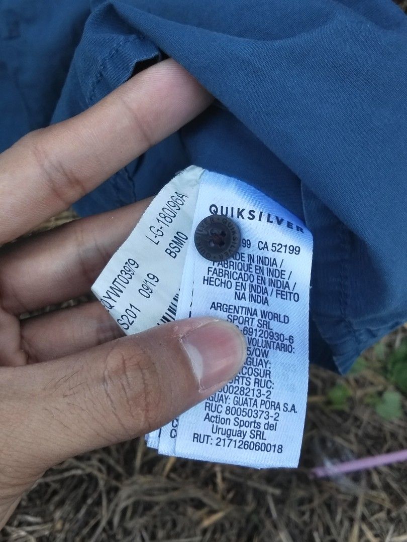 Quiksilver Blue Short Sleeve Button-Down Shirt (Category: Tshirts & Polo Shirts ) located in Quezon City. Submitted by kemjhon (Listing ID 1470447197, Image 3). Description: - Brand: Quiksilver - Style: Short sleeve button-down shirt with collar and front button closure - Colour: Teal blue (solid) - Size: Large (180/96A measurements) - Material: Comfortable 100% cotton - Fit: Regular fit with a convenient chest pocket - Condition/Use: Classic cas