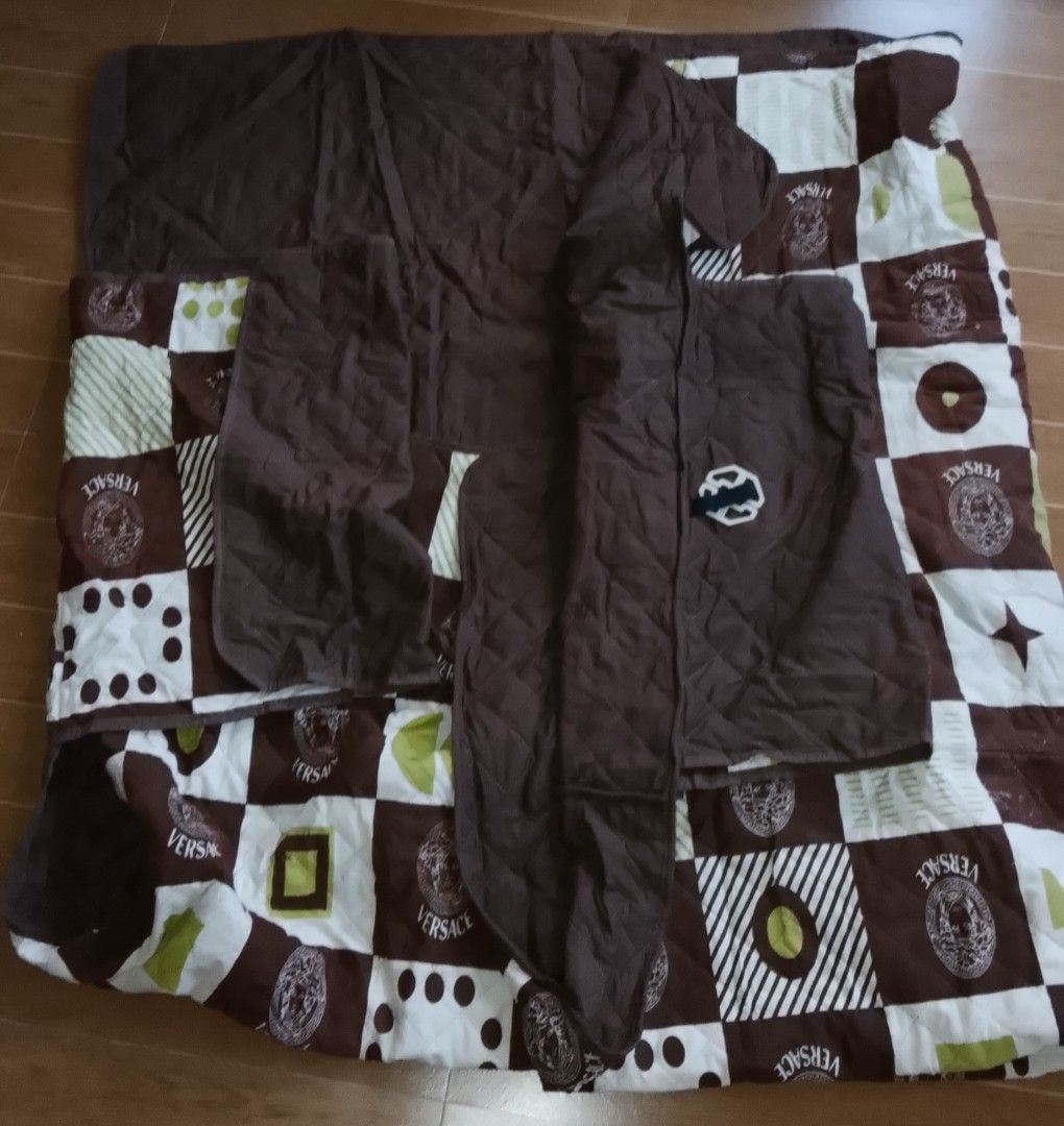 Quilted Checkered SOFA COVER / Protector Mat Set (3-Seater Size) (Category: Other Home Decor) located in Antipolo. Submitted by dclutterist (Listing ID 1470418945, Image 2). Description: ​✨ Quilted Checkered Sofa Protector Cover Set ✨ ​A multi-functional, non-slip sofa cover protector set in a brown, cream, and green checkered geometric pattern. Designed to protect your couch from dust, spills, wear, and pet hair. ​Features a soft quilted finish 