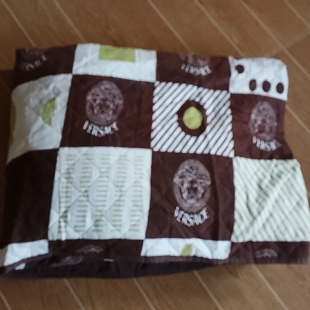Quilted Checkered SOFA COVER / Protector Mat Set (3-Seater Size) (Category: Other Home Decor) located in Antipolo. Submitted by dclutterist (Listing ID 1470418945, Image 3). Description: ​✨ Quilted Checkered Sofa Protector Cover Set ✨ ​A multi-functional, non-slip sofa cover protector set in a brown, cream, and green checkered geometric pattern. Designed to protect your couch from dust, spills, wear, and pet hair. ​Features a soft quilted finish 